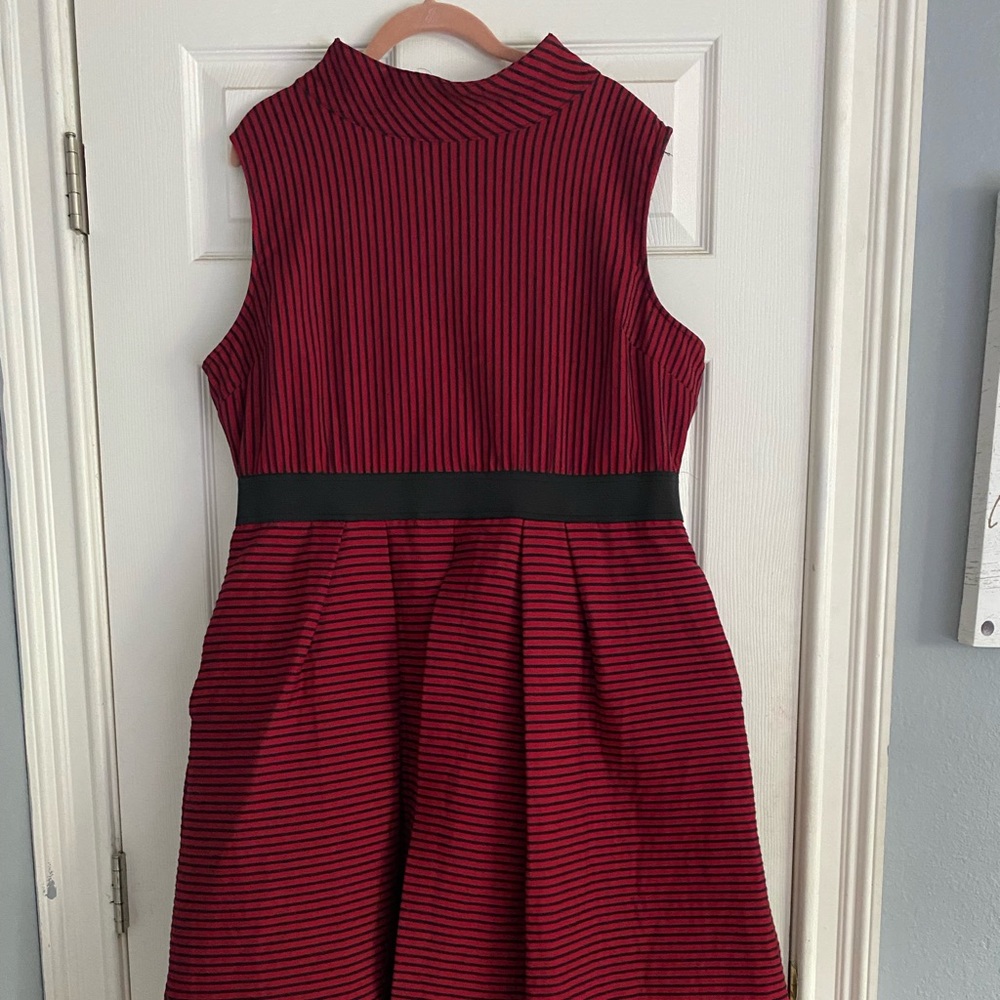 Sleeveless red and black mini dress with wrap